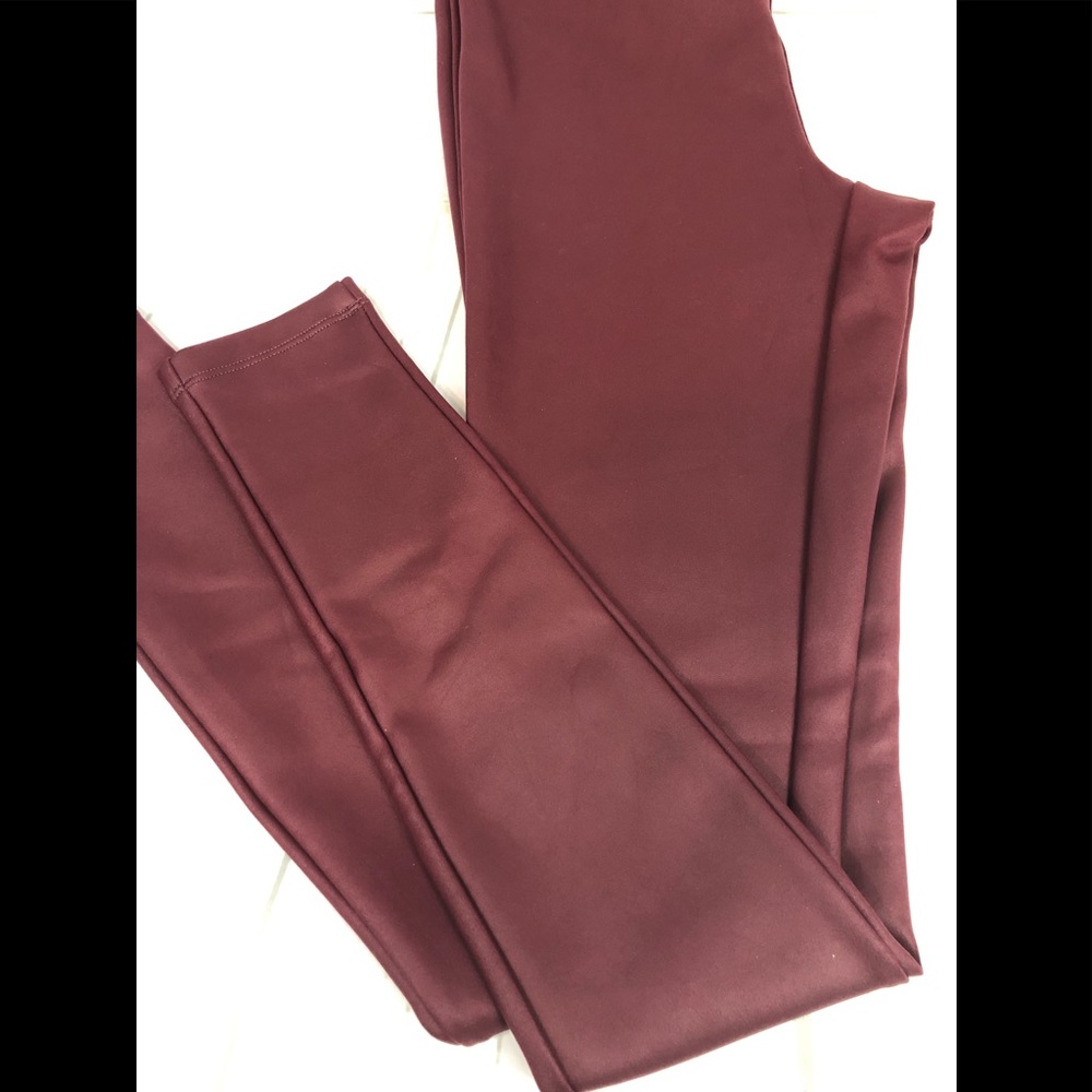 Express leggings with a sheen burgundy color